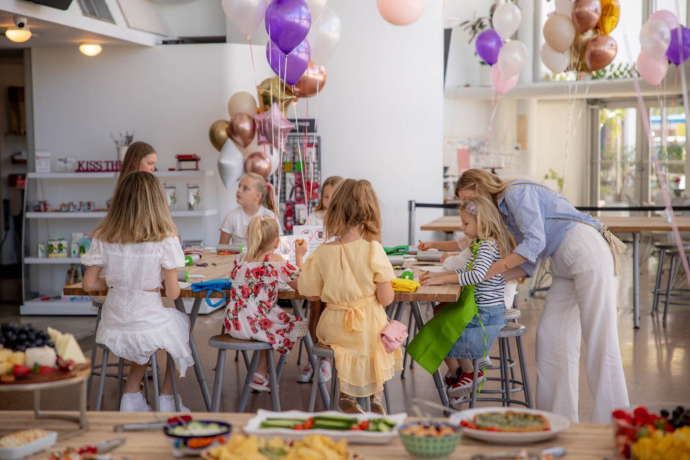 A picture of The Real Food Academy Miami's kids birthday party place, an indoor venue with tall windows.